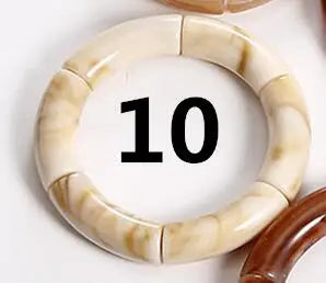 HIMBA COLOUR STACK SET – Vibrant Acrylic Beaded Charm Bracelets - Glow by Hellen African and Boho Jewelry African Home Decor Cultural Accessories