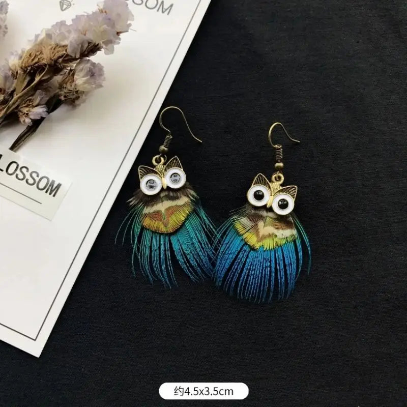 MAASAI PEACOCK PLUMES EARRINGS – Unique Imitation Feather Exaggerate Boho Statement Jewelry - Glow by Hellen African and Boho Jewelry African Home Decor Cultural Accessories