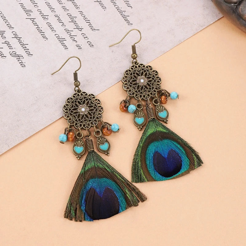 MAASAI PEACOCK PLUMES EARRINGS – Unique Imitation Feather Exaggerate Boho Statement Jewelry - Glow by Hellen African and Boho Jewelry African Home Decor Cultural Accessories