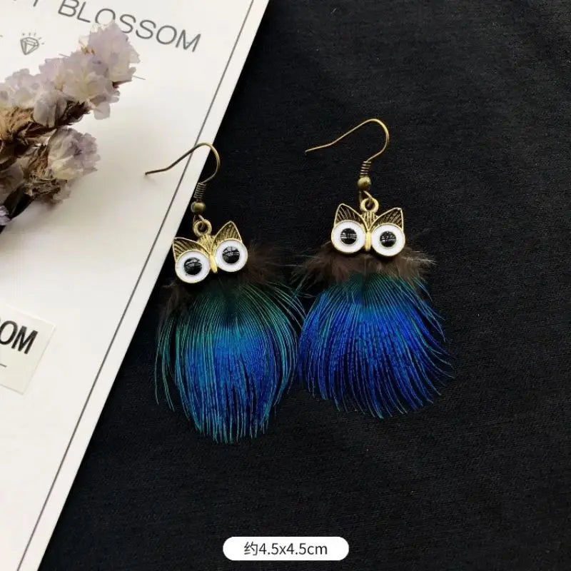 MAASAI PEACOCK PLUMES EARRINGS – Unique Imitation Feather Exaggerate Boho Statement Jewelry - Glow by Hellen African and Boho Jewelry African Home Decor Cultural Accessories