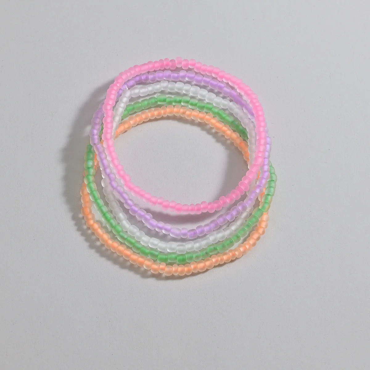 Luminous Rainbow Anklet Set – 5-Piece Acrylic Rice Bead Anklets - Glow by Hellen African and Boho Jewelry African Home Decor Cultural Accessories