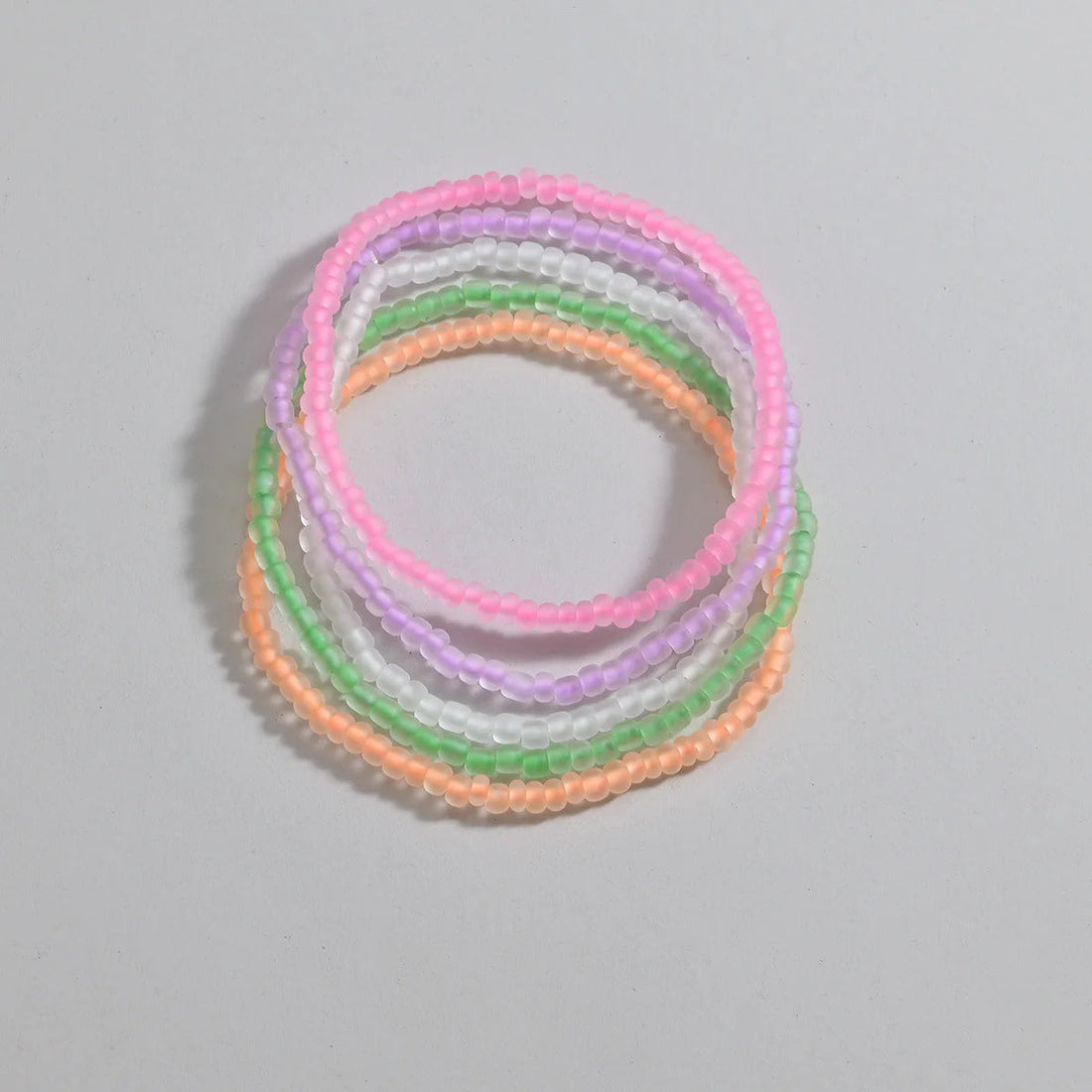 Luminous Rainbow Anklet Set – 5-Piece Acrylic Rice Bead Anklets - Glow by Hellen African and Boho Jewelry African Home Decor Cultural Accessories