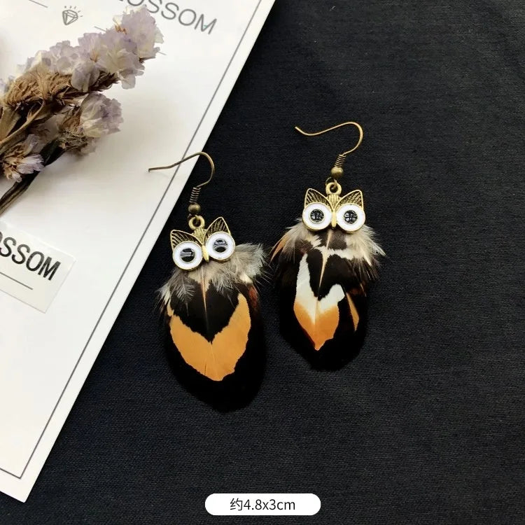 MAASAI PEACOCK PLUMES EARRINGS – Unique Imitation Feather Exaggerate Boho Statement Jewelry - Glow by Hellen African and Boho Jewelry African Home Decor Cultural Accessories