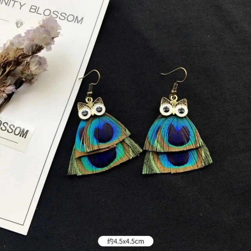 MAASAI PEACOCK PLUMES EARRINGS – Unique Imitation Feather Exaggerate Boho Statement Jewelry - Glow by Hellen African and Boho Jewelry African Home Decor Cultural Accessories
